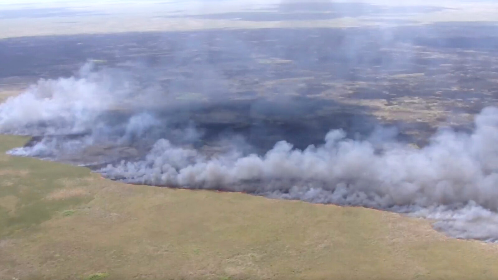 Aerial view of wildfire burning across Southeast Georgia landscape